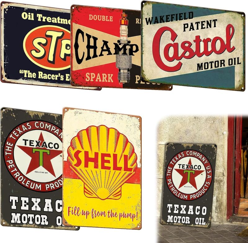 Placas vintage de marcas de óleos automotivos famosos.