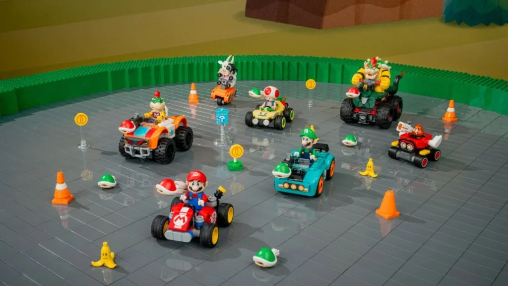 Personagens LEGO Super Mario em karts numa pista de corrida.