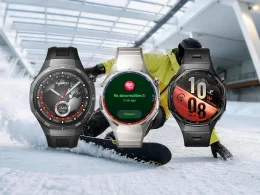 Três smartwatches Huawei sobrepostos a um snowboarder na neve.