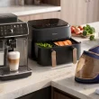 Eletrodomésticos Philips modernos numa bancada de cozinha de mármore.