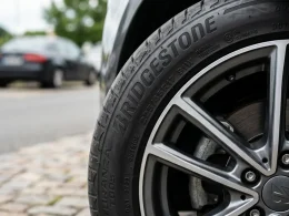 Close-up of Bridgestone tire on a car with alloy wheel