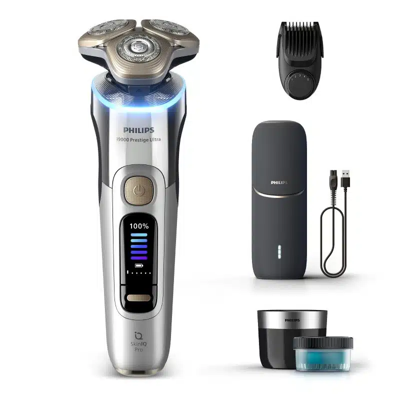 Máquina de barbear elétrica com acessórios completos.
