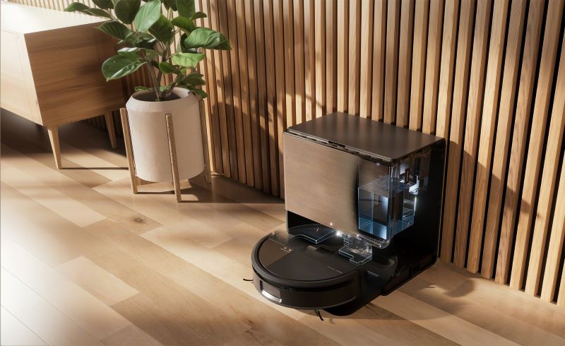 Aspirador robô moderno em sala de estar elegante.