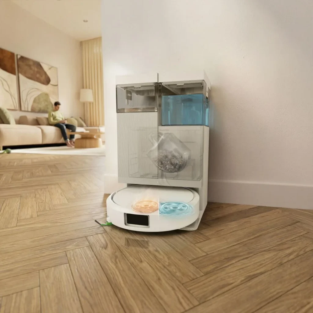 Aspirador robô branco na sua base de autolimpeza transparente.